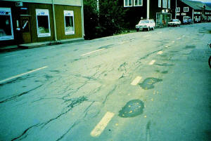 Frost heave on a city street in central Sweden.