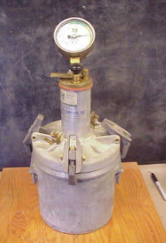 Pressure meter used to measure the air content of a concrete mix.