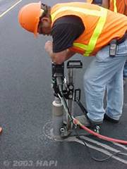 Taking a Pavement Core for Density Quality Control