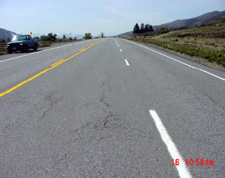 SR 97A looking south from MP 207.37 showing wheelpath cracking.