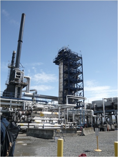 The vacuum distillation tower is considerably wider than atmospheric columns.