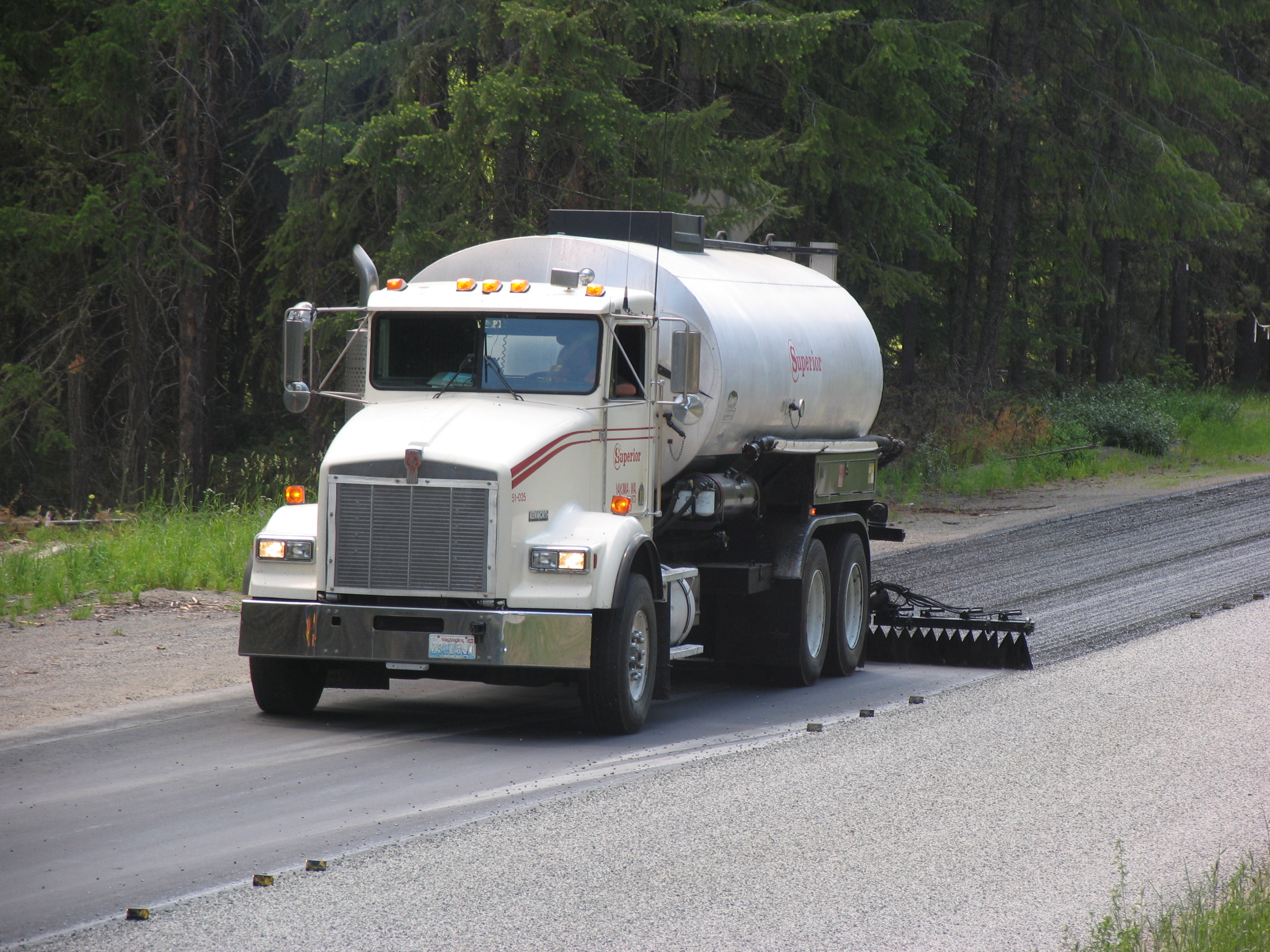 Spray truck applying CRS-2P emulsion at a shot rate of 0.52 gallons/square yard (later increased to 0.58).
