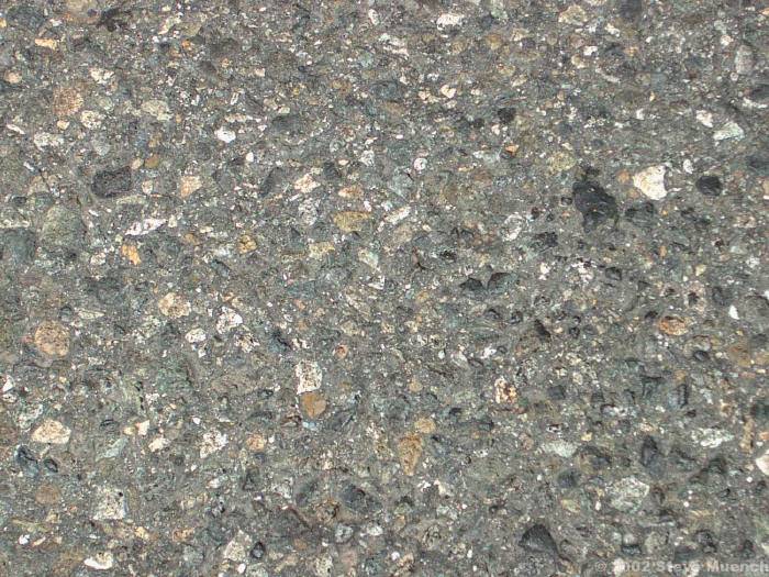 Close up of polished Hot Mix Asphalt aggregate.