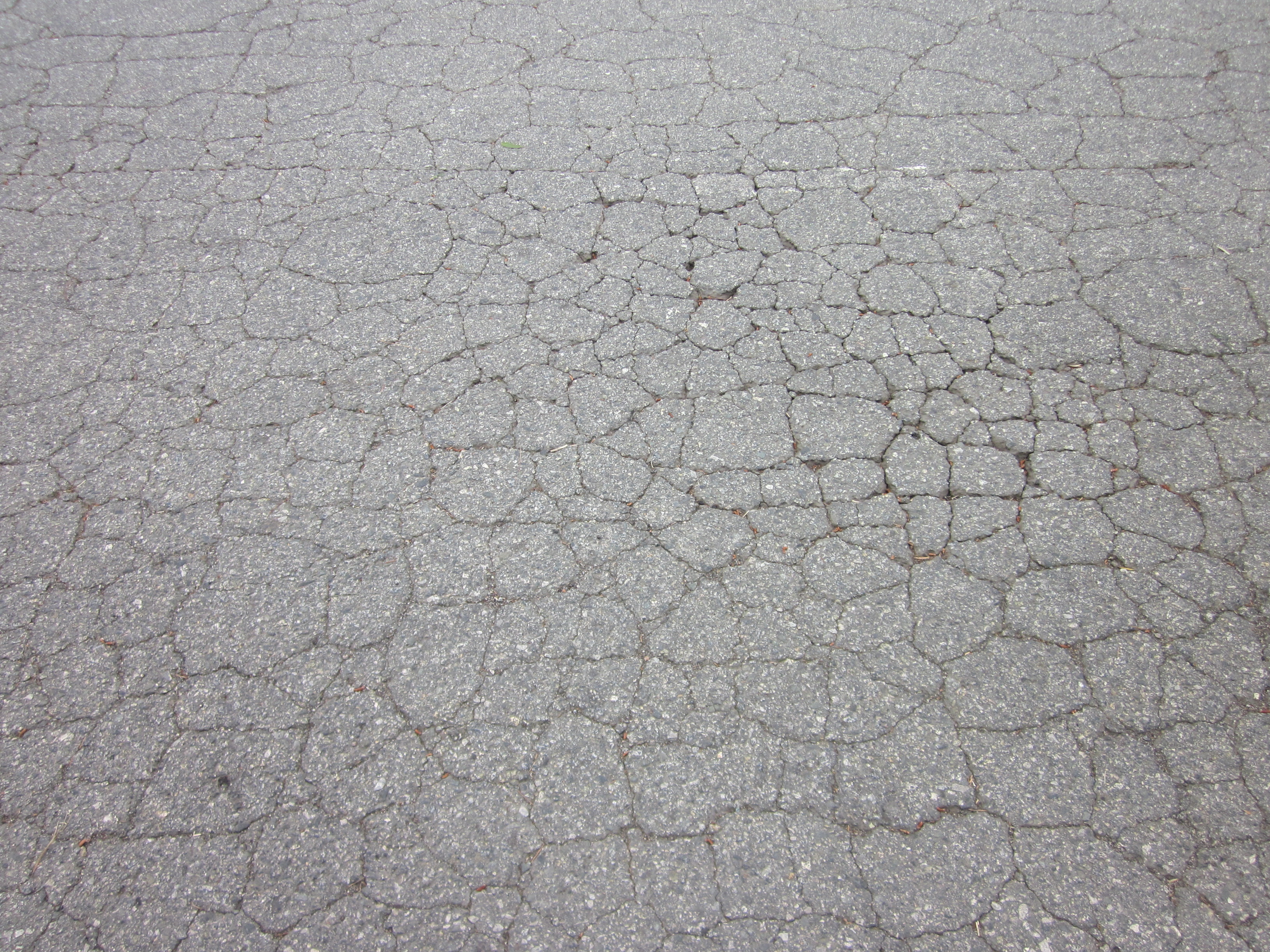 Projected pavement distresses are used as performance indicators.