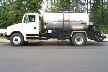 An asphalt distributor truck used to apply tack coat.